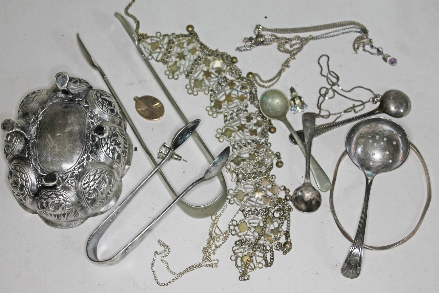 A quantity of silver and silver plate including an eastern white metal footed dish. The-saleroom.com