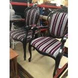 A pair of black French style armchairs The-saleroom.com showing catalogue only, live bidding