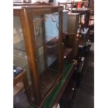 A display cabinet. The-saleroom.com showing catalogue only, live bidding available via our