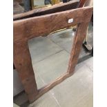 A rustic wood framed mirror The-saleroom.com showing catalogue only, live bidding available via