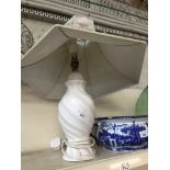 White pottery lamp The-saleroom.com showing catalogue only, live bidding available via our