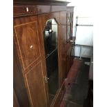 Inlaid Edwardian mirror door wardrobe The-saleroom.com showing catalogue only, live bidding