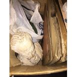 A box of misc to include old records, Bosch drill and a plaster bust. The-saleroom.com showing