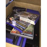 A PS2 console, controllers and games. The-saleroom.com showing catalogue only, live bidding