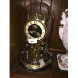 Revolving pendulum clock The-saleroom.com showing catalogue only, live bidding available via our