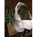 A light-up pottery Xmas tree and a bag with a xmas wreath The-saleroom.com showing catalogue only,