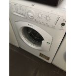 A Hotpoint Aquarius washing machine The-saleroom.com showing catalogue only, live bidding