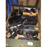 A box of electrical items to include telephones, cables, microphone, etc. The-saleroom.com showing