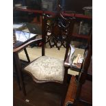 An Edwardian inlaid mahogany armchair The-saleroom.com showing catalogue only, live bidding