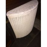 A white woven corner bedding basket The-saleroom.com showing catalogue only, live bidding