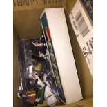 A box of model cars and Military figures The-saleroom.com showing catalogue only, live bidding