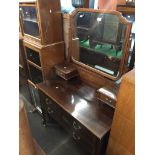 An Edwardian inlaid mahogany dressing table. The-saleroom.com showing catalogue only, live bidding