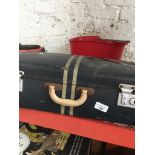 A vintage suitcase The-saleroom.com showing catalogue only, live bidding available via our