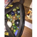 A bag of marbles The-saleroom.com showing catalogue only, live bidding available via our website. If