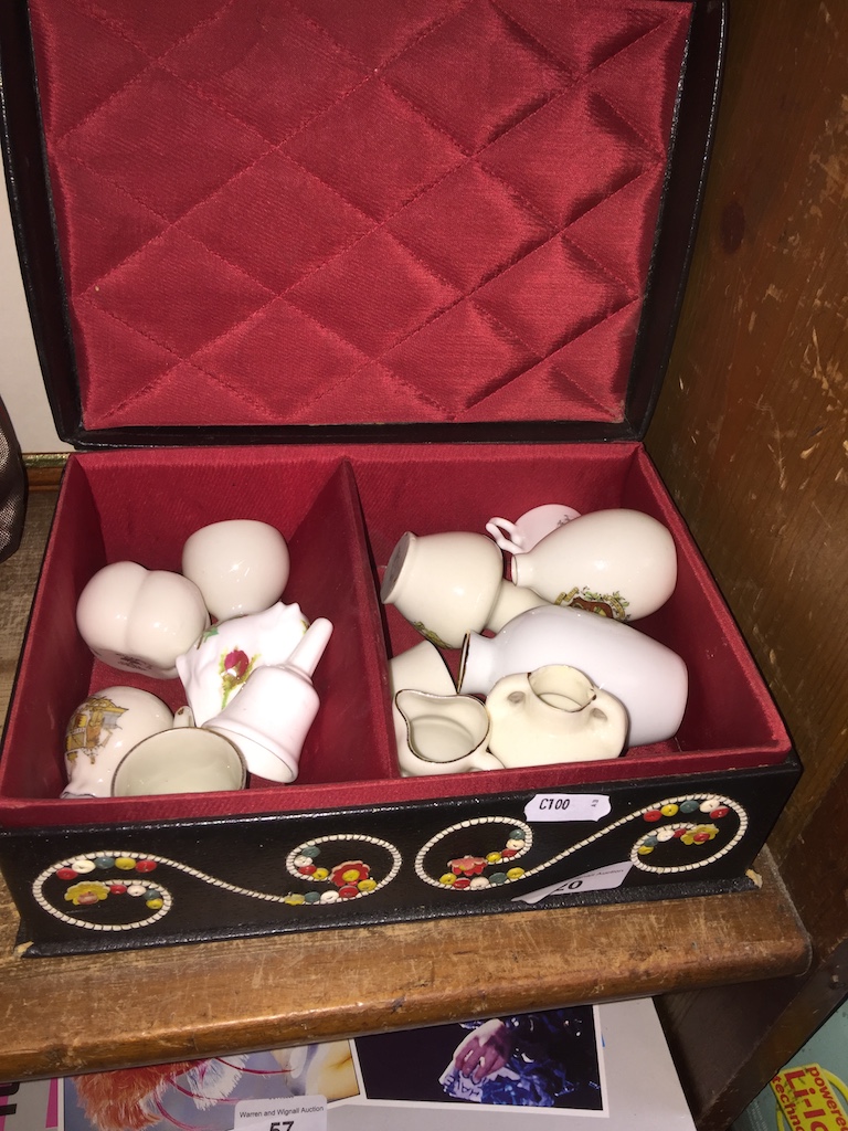 An ornate padded jewellery box with crested china ornaments The-saleroom.com showing catalogue only,