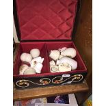 An ornate padded jewellery box with crested china ornaments The-saleroom.com showing catalogue only,