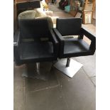 A pair of swivel barber's chairs. The-saleroom.com showing catalogue only, live bidding available