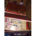 A box of stamp albums. The-saleroom.com showing catalogue only, live bidding available via our
