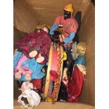 A box of small dolls in varied costumes The-saleroom.com showing catalogue only, live bidding