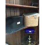 A top hat in a box The-saleroom.com showing catalogue only, live bidding available via our