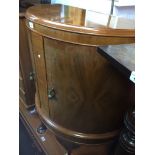 Bow front 1920s mahogany cabinet and a magazine rack The-saleroom.com showing catalogue only, live