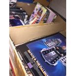 2 boxes of Dr. Who ephemera to include magazines, games, toys, etc. The-saleroom.com showing