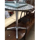 A metal cafe table The-saleroom.com showing catalogue only, live bidding available via our