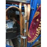 A bundle of walking sticks. The-saleroom.com showing catalogue only, live bidding available via