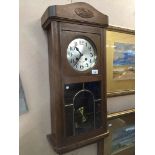 Chiming oak wallclock The-saleroom.com showing catalogue only, live bidding available via our