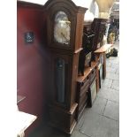 A reproduction West Minster chime grandfather clock The-saleroom.com showing catalogue only, live