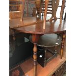Round dining table and a magazine rack The-saleroom.com showing catalogue only, live bidding
