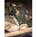 A box of camouflague equipment, jackets, ruck sacks, etc The-saleroom.com showing catalogue only,