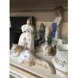 Six Nao figures and a Royal Doulton figure The-saleroom.com showing catalogue only, live bidding
