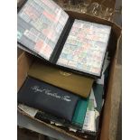 A large box of stamp albums, etc. The-saleroom.com showing catalogue only, live bidding available