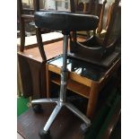 A swivel stool. The-saleroom.com showing catalogue only, live bidding available via our website.