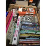 A box of books, DVDs, etc. The-saleroom.com showing catalogue only, live bidding available via our