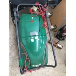 A Qualcast Cyclone 6000 electric lawn mower The-saleroom.com showing catalogue only, live bidding