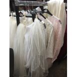 5 bridal dresses and a veil + some accessories to include tiaras. The-saleroom.com showing catalogue