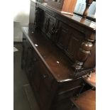 Ercol dark elm buffet sideboard The-saleroom.com showing catalogue only, live bidding available