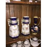 A pair of Japanese porcelain vases and a pottery jug. The-saleroom.com showing catalogue only,