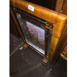 A landscape and mirrored firescreen The-saleroom.com showing catalogue only, live bidding