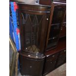 A reproduction corner cabinet The-saleroom.com showing catalogue only, live bidding available via