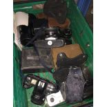 A box of cameras to include Chinon CX, Minolta 7000, Brownie, etc. The-saleroom.com showing
