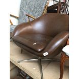 A retro egg swivel chair. The-saleroom.com showing catalogue only, live bidding available via our