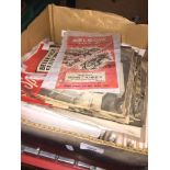 A box containing approx. 500+ speedway racing programmes 1940s - 1970s. The-saleroom.com showing