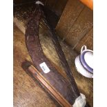 Boomerang and wooden spear head The-saleroom.com showing catalogue only, live bidding available