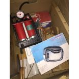 A box of misc to include aerosols, Breville iron, pump, sander, etc. Catalogue only, live bidding