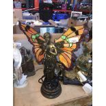 A Tiffany style figural fairy lamp Catalogue only, live bidding available via our website, if you