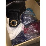 A box of handbags and bags. Catalogue only, live bidding available via our website, if you require