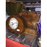 Small inlaid oak mantel clock and oak letter rack Catalogue only, live bidding available via our